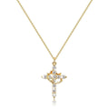 Gold cross pendant necklace with diamonds on a white background