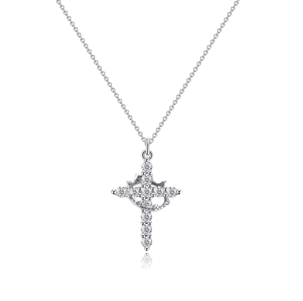 Silver cross pendant necklace on a white background