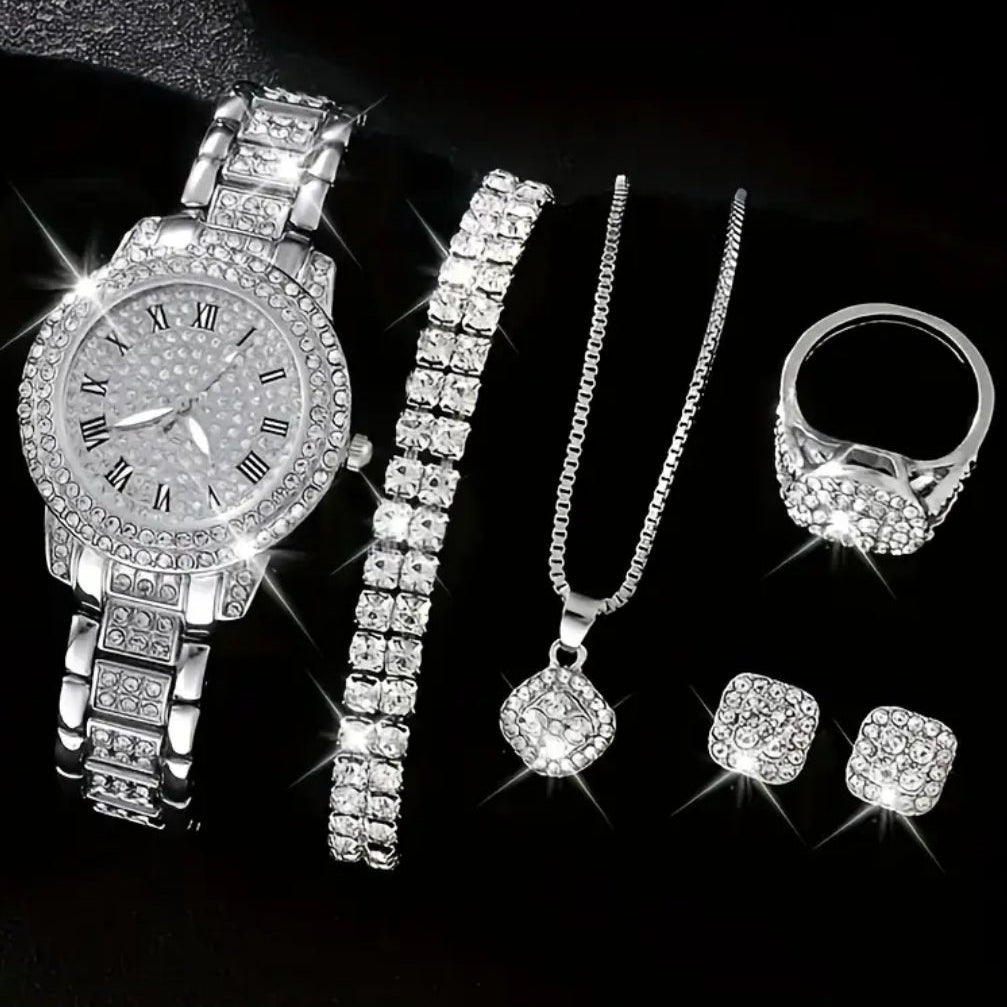 Silver jewelry set including a watch, bracelet, necklace, ring, and earrings on a black background.